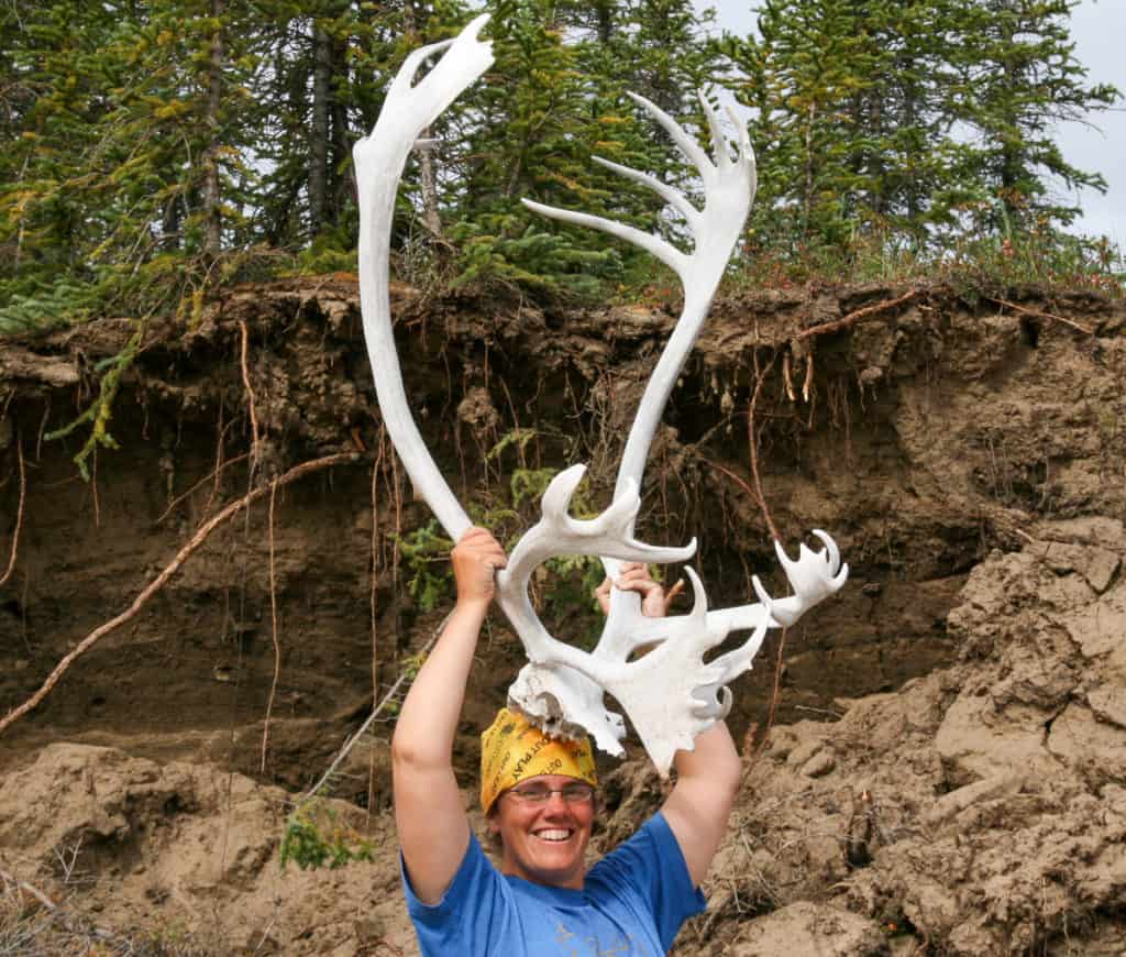 Heather holding a caribou rack on her head