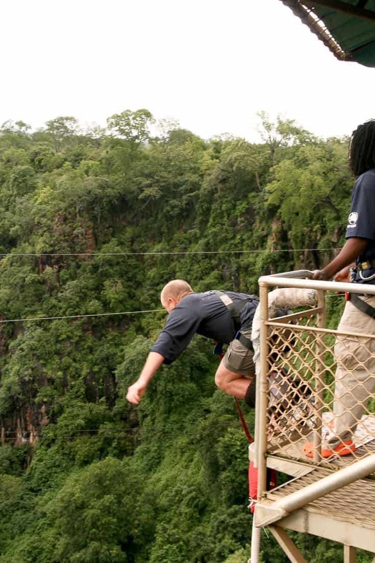 Old guy bungee Jumping at Victoria Falls