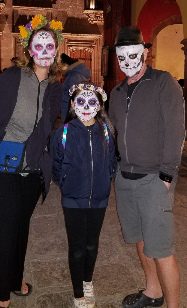 Matt, Heather and girl dressed up for Day of the Dead