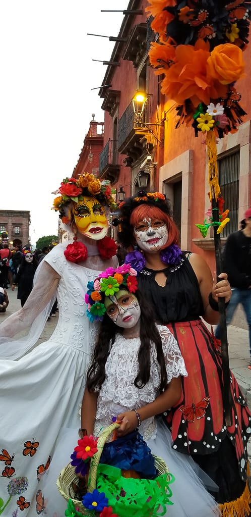 3 women dressed up for day of the dead