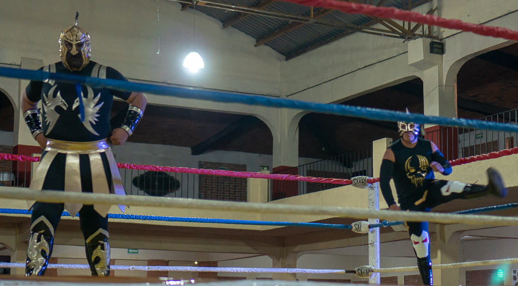 2 Luche Libre Wrestlers waiting for their opponents to arrive