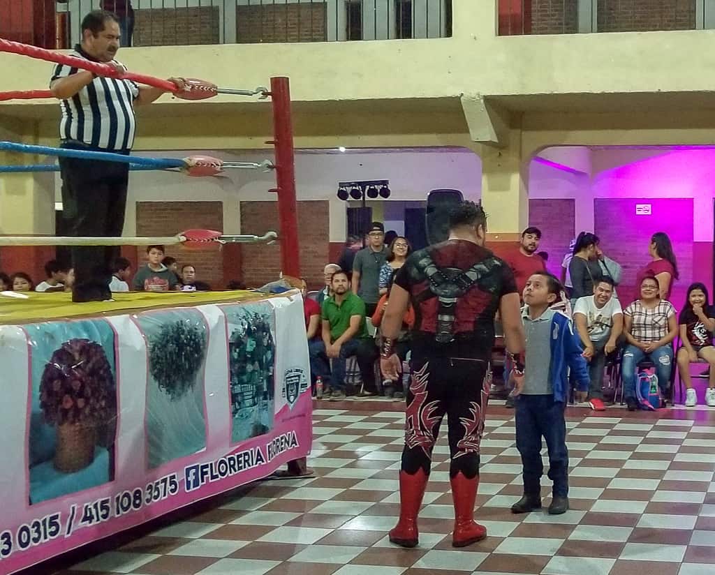 A showdown with the crowd and one of the guys at a Luche Libre Wrestling event