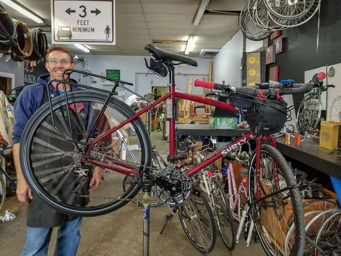 Volunteer at Delta Bike Project with Heather's bike after tuning it