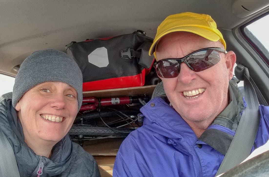 Matt and Heather in their car packed to the brim