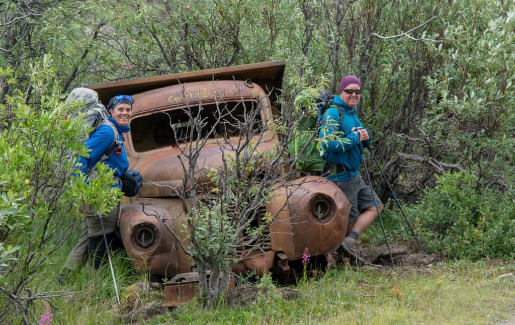 Matt and Heather beside an abandoned truck on the Canol Trail