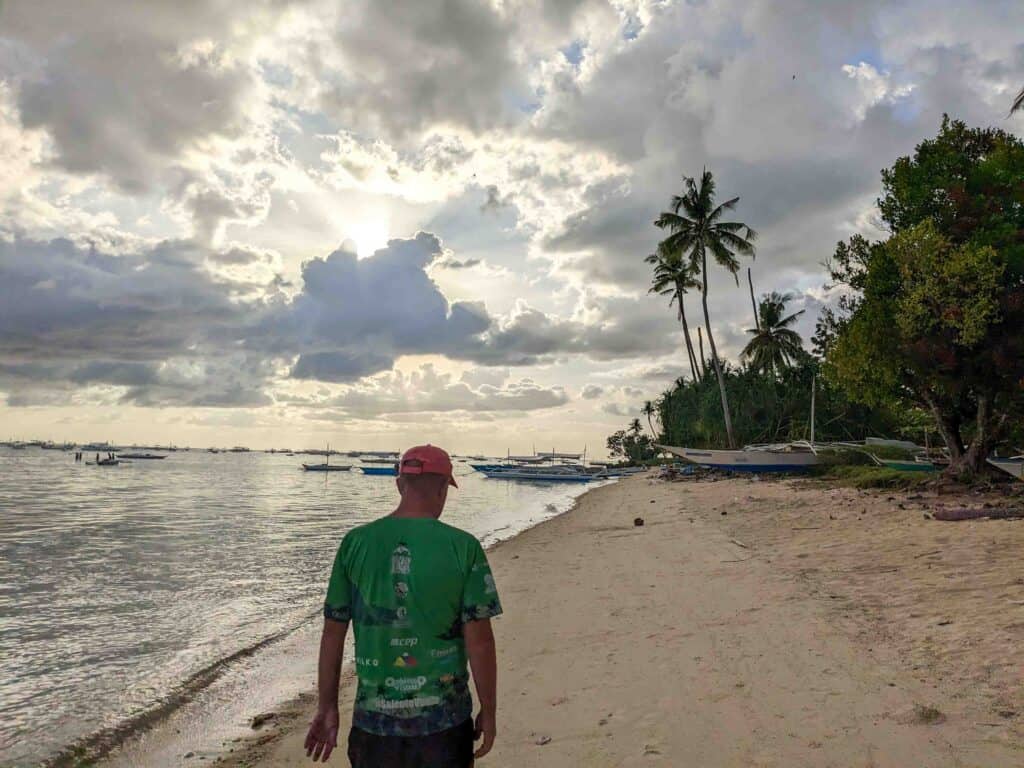 A man walking on a beach
