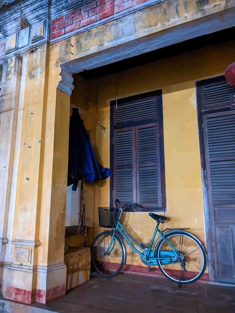 Bicycle leaning against house in Hoi An
