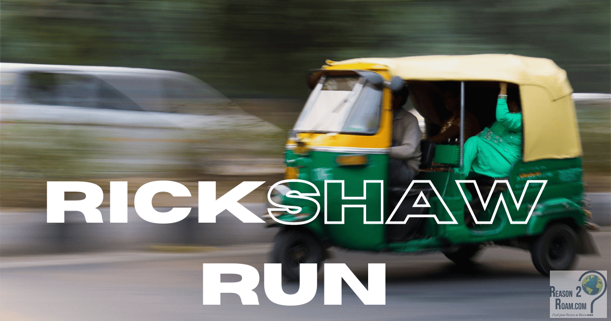 Picture of a Rickshaw with the words Rickshaw Run in front of it