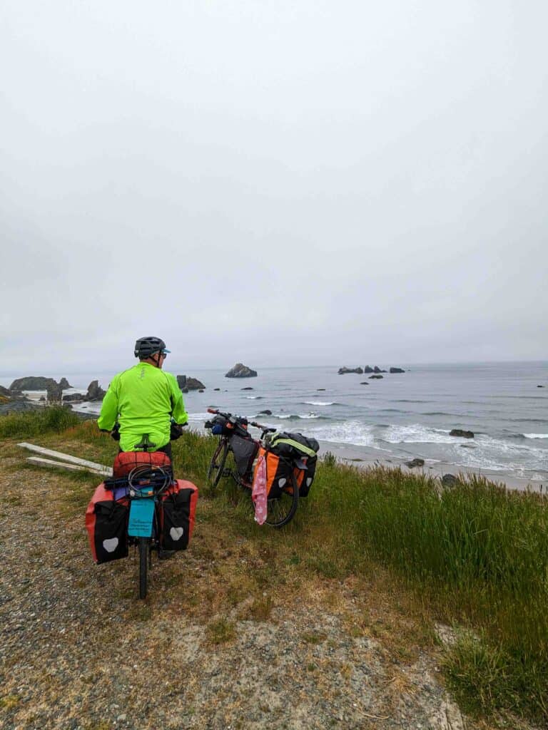 Two bicycles by the ocean