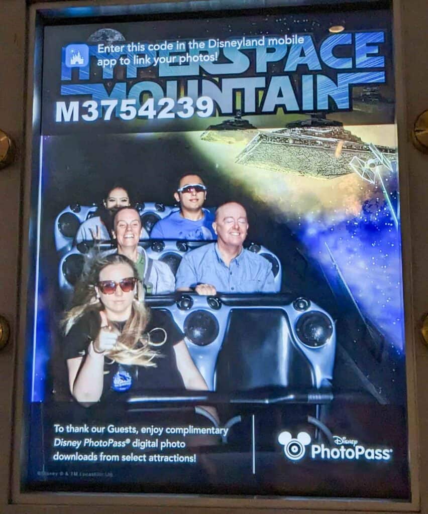 Screenshot of two people on Hyperspace Mountain in Disneyland